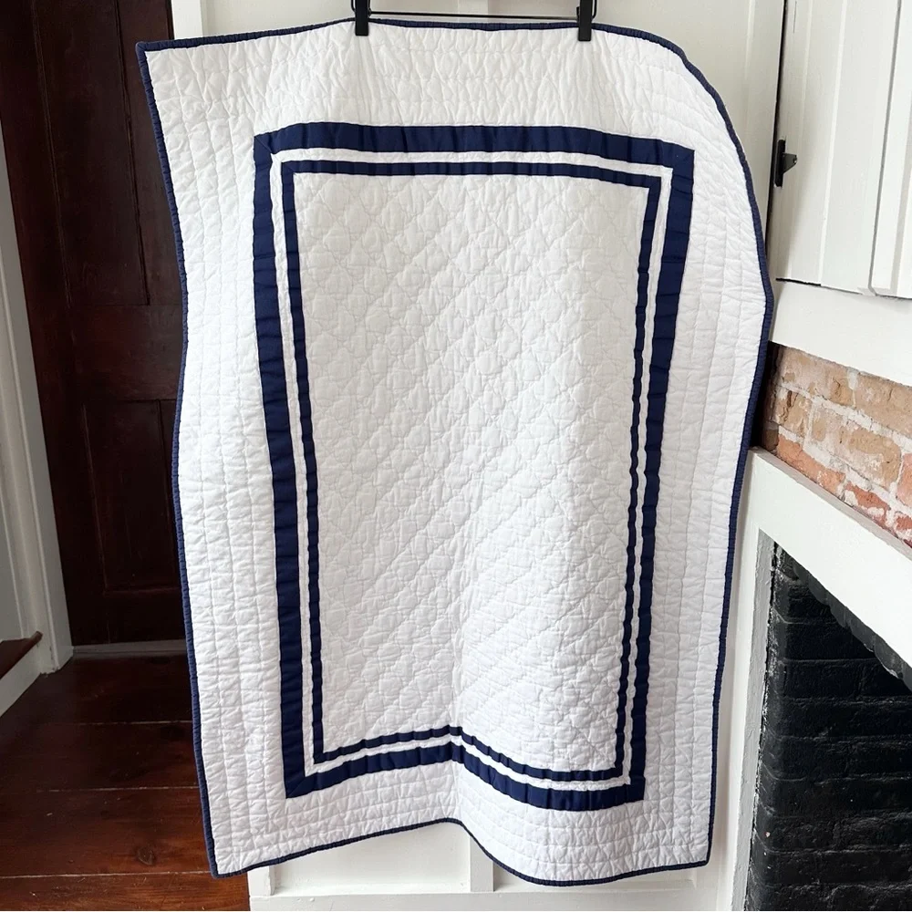 POTTERY BARN KIDS white Harper navy trim baby quilt